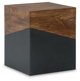 Ashley Furniture Trailbend Accent Table showing a wooden surface with a smooth finish and decorative design.
