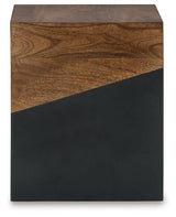 Ashley Furniture Trailbend Accent Table with a wood finish, featuring a round top and stylish tapered legs.