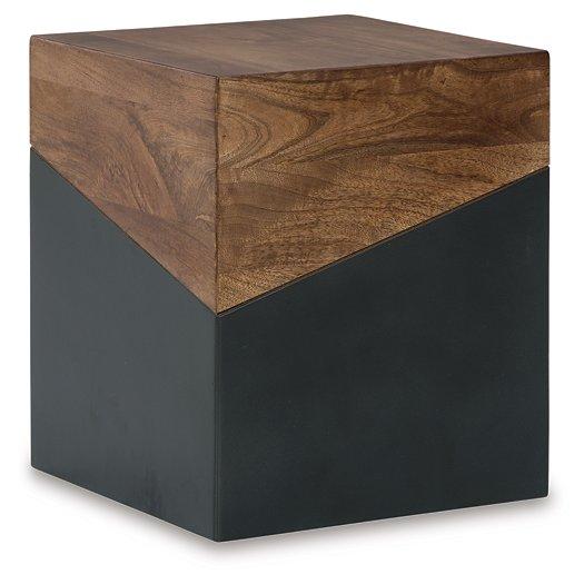 Ashley Furniture Trailbend Accent Table with wood finish and modern design, shown with decorative items on top.