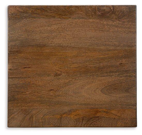 Ashley Furniture Trailbend accent table with a wooden top and metal legs, ideal for living room or bedroom decor.