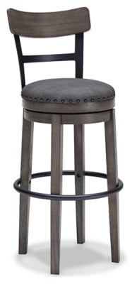 Ashley Furniture Caitbrook bar height barstool with wooden legs and upholstered seat, shown from an angled view.