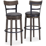 Ashley Furniture Caitbrook bar height bar stool with wooden legs and cushioned seat in a modern design