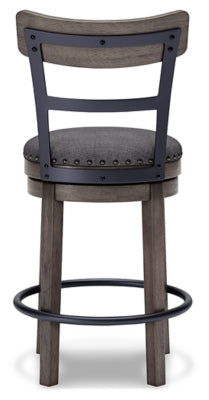 Ashley Furniture Caitbrook counter height bar stool with a wooden backrest and cushioned seat, perfect for kitchen or bar areas.