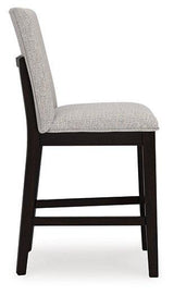 Ashley Furniture Neymorton counter height barstool with wooden legs and upholstered seat, ideal for kitchen or bar area.