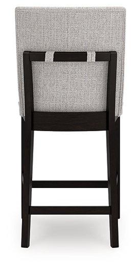 Ashley Furniture Neymorton counter height barstool with wooden legs and upholstered seat, ideal for kitchen or bar area.