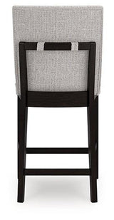 Ashley Furniture Neymorton counter height barstool with wooden legs and upholstered seat, ideal for kitchen or bar area.