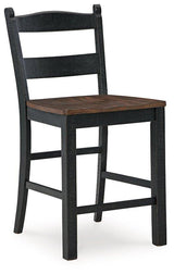 Ashley Furniture Valebeck counter height barstool with wooden legs and upholstered seat, ideal for kitchen or bar area.