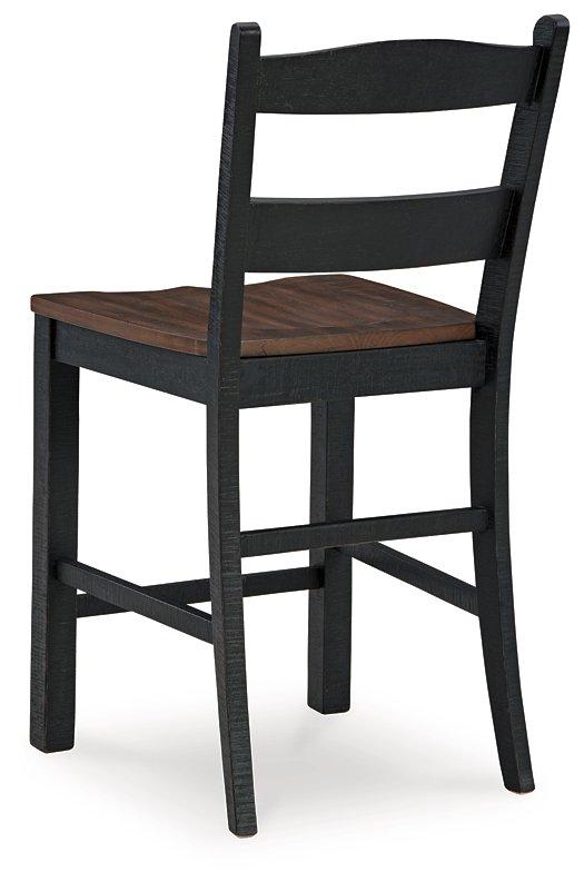 Ashley Furniture Valebeck counter height barstool with wooden frame and cushioned seat, ideal for kitchen or bar area.