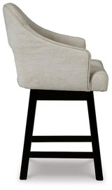 Tallenger counter height bar stool by Ashley Furniture with wooden legs and cushioned seat, ideal for kitchen or bar area.