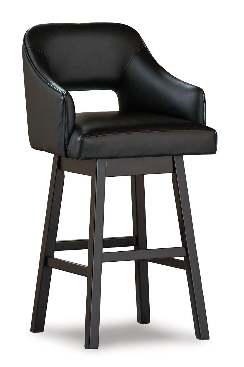 Set of Ashley Furniture Tallenger barstools with wooden legs and cushioned seats, ideal for kitchen or bar area.