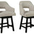 Set of Ashley Furniture Tallenger barstools with wooden legs and upholstered seats, ideal for kitchen or bar area.