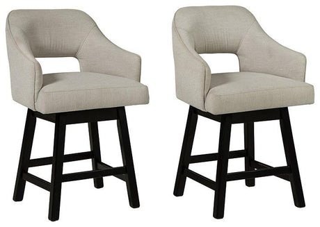 Set of Ashley Furniture Tallenger barstools with wooden legs and upholstered seats, ideal for kitchen or bar area.
