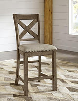 Set of four Ashley Furniture Moriville barstools with wooden seats and metal legs, ideal for kitchen or bar area.