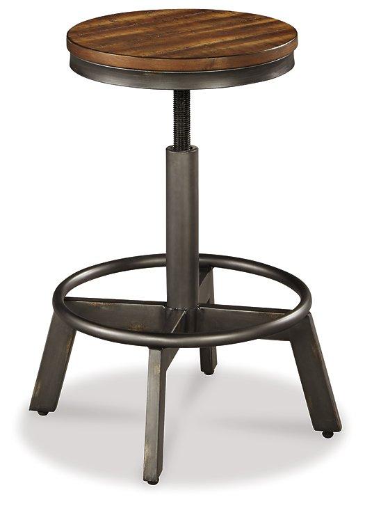Set of four Ashley Furniture Torjin barstools with wooden legs and upholstered seats, perfect for kitchen or bar area.