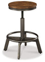 Set of four Ashley Furniture Torjin barstools with wooden legs and upholstered seats, perfect for kitchen or bar area.
