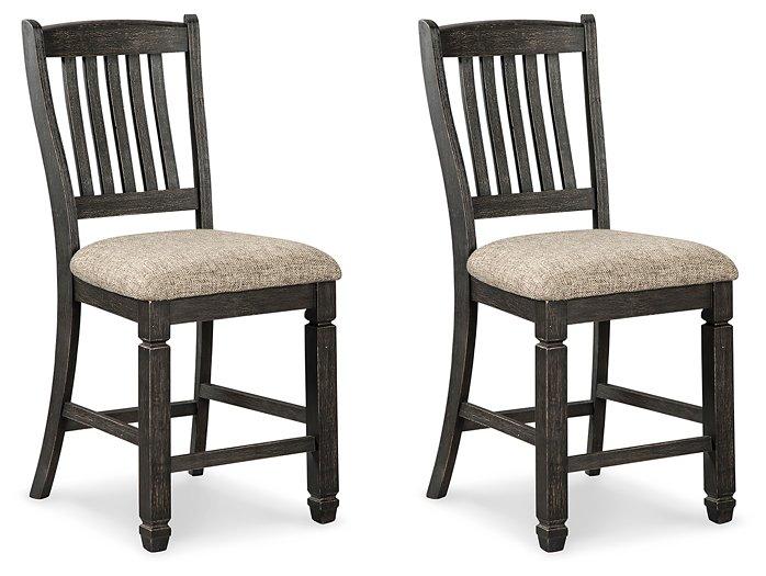 Set of four Ashley Furniture Tyler Creek barstools featuring wooden seats and metal frames, ideal for kitchen or counter seating.