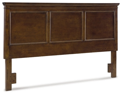 Ashley Furniture Danabrin panel storage bed with a wood finish, featuring built-in storage drawers and a modern bedroom design.