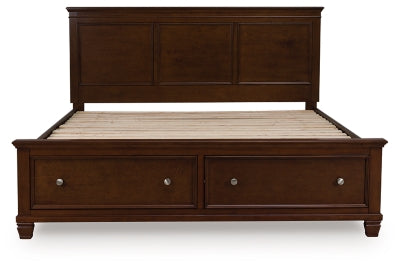 Ashley Furniture Danabrin Panel Storage Bed with a headboard, showcasing a modern wood finish and built-in storage drawers.