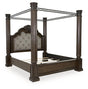 Ashley Furniture Maylee Bed with a sleek upholstered headboard and wooden frame, shown from an angled side view.