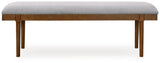 Ashley Furniture Lyncott 59-inch upholstered dining bench with cushioned seat and wooden legs, ideal for kitchen or dining room seating.