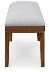 Ashley Furniture Lyncott 59-inch upholstered dining bench with padded seat and wooden legs, ideal for modern dining rooms.