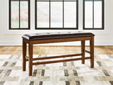 Ashley Furniture Ralene counter height dining bench with wooden finish and cushioned seat, ideal for kitchen or dining room seating.