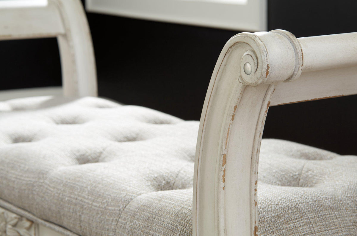 Ashley Furniture Realyn Accent Bench with wooden legs and upholstered seat, ideal for entryways or living room decor.