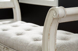 Ashley Furniture Realyn Accent Bench with wooden legs and upholstered seat, ideal for entryways or living room decor.