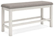 Robbinsdale 49-inch counter height dining bench by Ashley Furniture, showing a wooden bench with a smooth finish and sturdy legs.