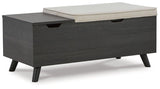Ashley Furniture Yarlow Storage Bench with cushioned top and wooden legs, ideal for entryway or living room storage and seating.