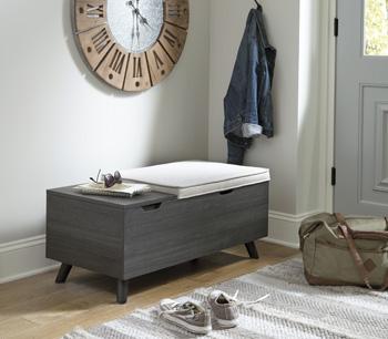 Ashley Furniture Yarlow Storage Bench with cushioned top and wooden base, ideal for entryway or living room storage and seating.