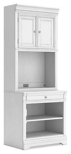 Ashley Furniture Kanwyn bookcase with multiple shelves, wooden finish, and open storage for books and decorative items.