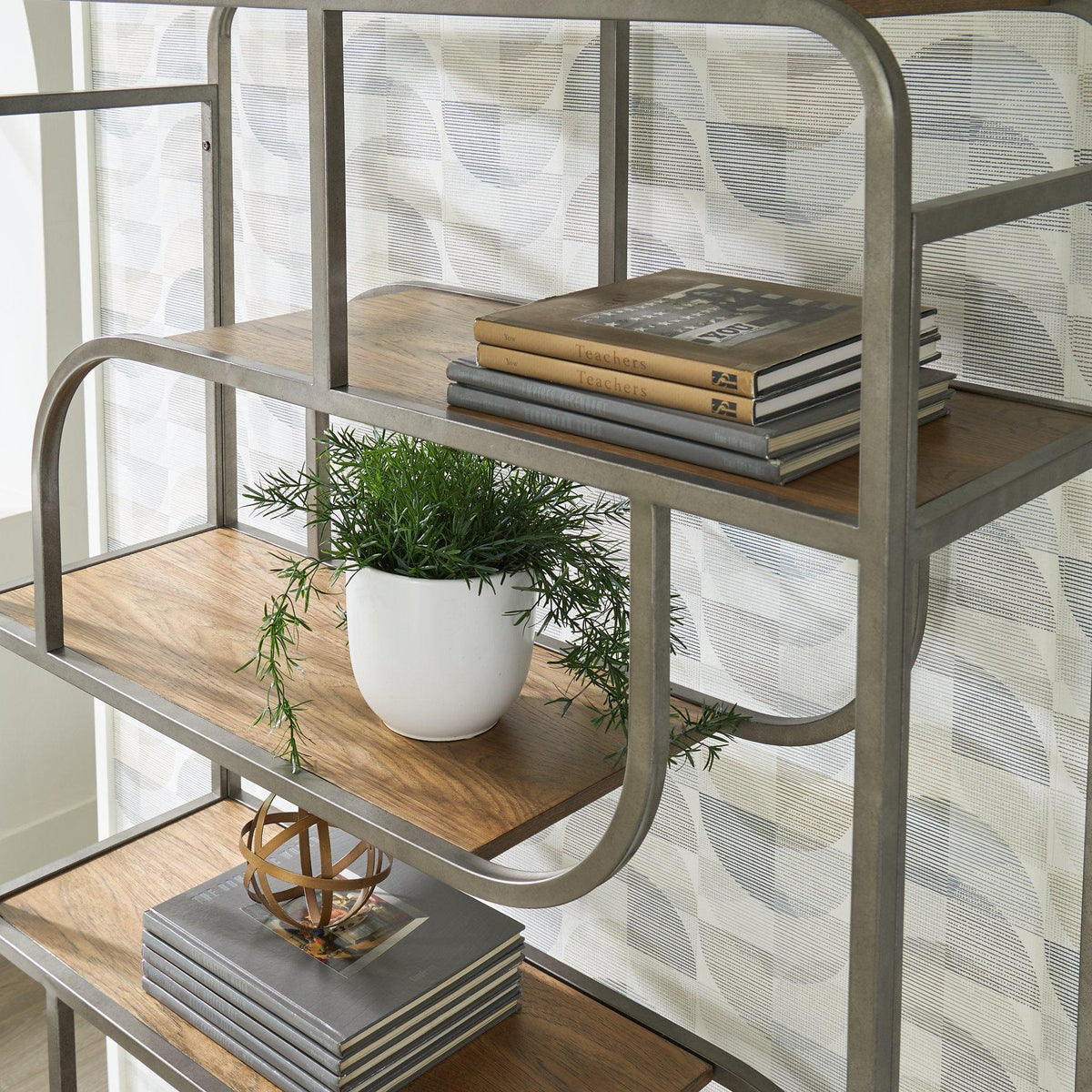 Ashley Furniture Jaddon Bookcase with open shelves and wood finish, showcasing a stylish storage solution for living rooms or offices.