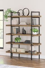 Montia 76-inch wooden bookcase by Ashley Furniture with multiple shelves for storage and display.