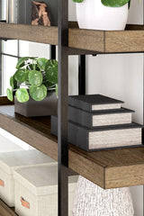 Montia 76-inch wooden bookcase by Ashley Furniture with multiple shelves and open storage for books and decorative items.