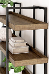 Montia 76-inch wooden bookcase by Ashley Furniture with multiple shelves for books and decor display.