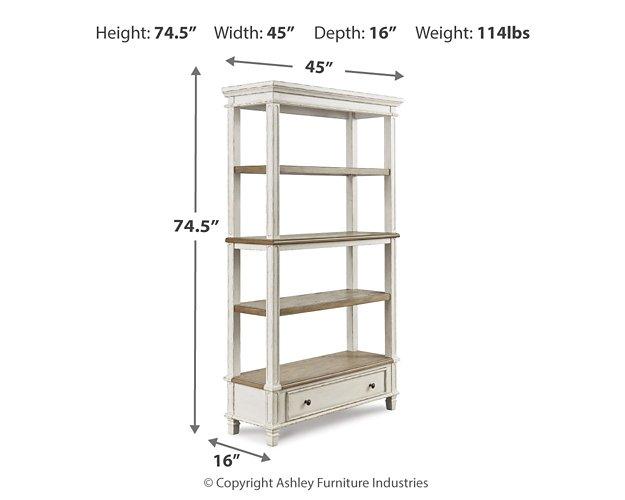 Ashley Furniture Realyn 75-inch wooden bookcase with multiple shelves and a classic design for living room or office storage.