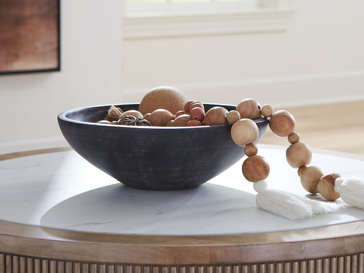 Ashley Furniture Meadie Bowl, a stylish ceramic bowl with intricate patterns, perfect for serving or decorative use.