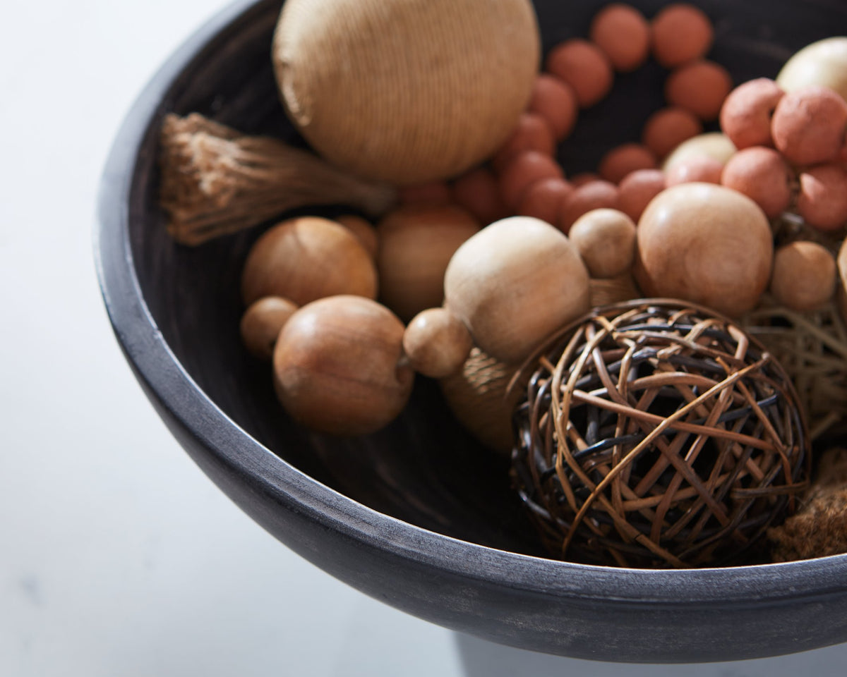 Ashley Furniture Meadie Bowl, decorative ceramic bowl with intricate patterns, displayed on a wooden surface.