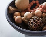 Ashley Furniture Meadie Bowl, decorative ceramic bowl with intricate patterns, displayed on a wooden surface.