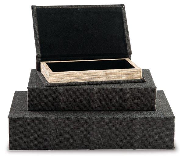 Set of three Ashley Furniture Jolina storage boxes with sleek design, ideal for organizing home decor and accessories.