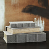 Set of three Ashley Furniture Jolina boxes with wooden lids and decorative metal accents, arranged on a neutral background.