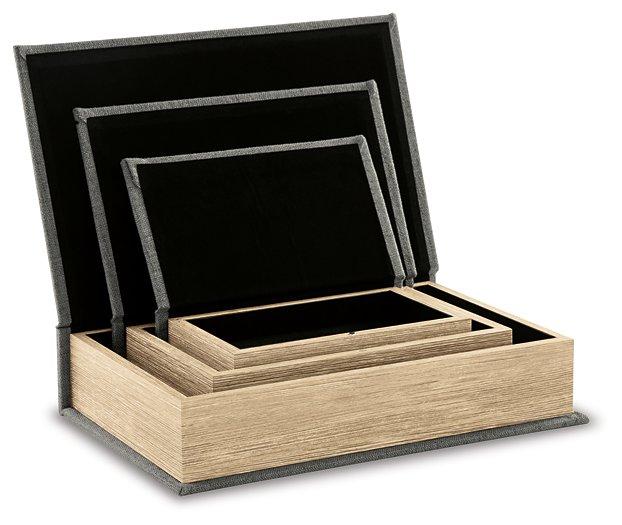Set of three Jolina storage boxes by Ashley Furniture with elegant wooden lids and fabric bodies, ideal for stylish home organization.