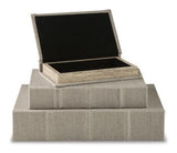 Set of three Ashley Furniture Jolina boxes, rectangular storage boxes with decorative patterns and wooden accents.
