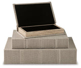 Set of three Ashley Furniture Jolina boxes with decorative lids, perfect for stylish storage and organization.