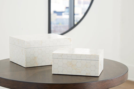 Set of two Aldenburg storage boxes by Ashley Furniture, wooden box with metal handles for organization and decor.