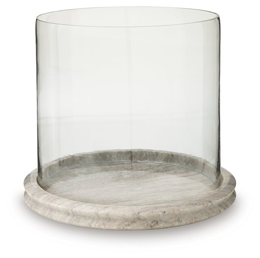 Ashley Furniture Saskia candle holder with a sleek, modern design featuring a metallic finish and a wide base for stability.