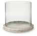 Ashley Furniture Saskia candle holder with a sleek, modern design featuring a metallic finish and a wide base for stability.