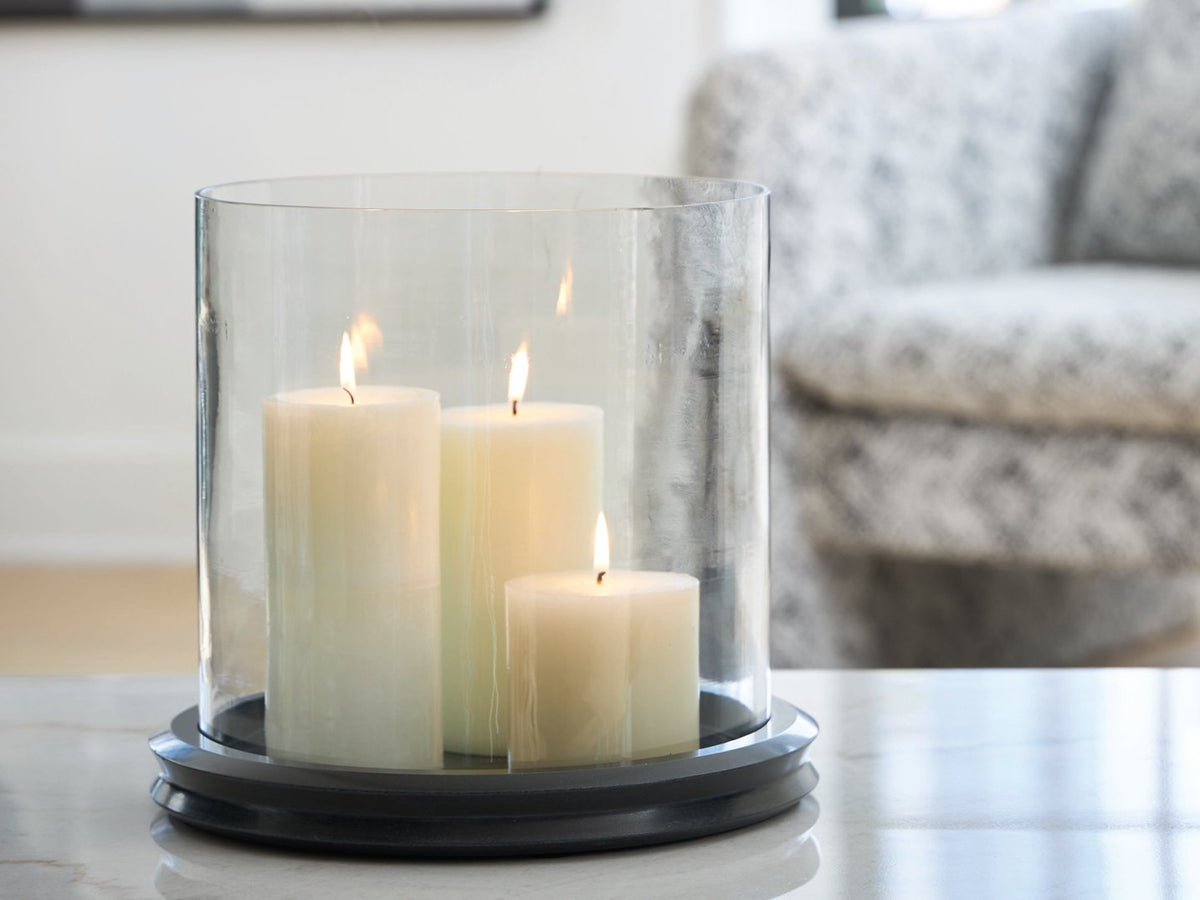 Ashley Furniture Saskia candle holder with a sleek, modern design, perfect for decorative lighting displays.