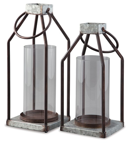 Set of two Diedrick lantern candle holders by Ashley Furniture, featuring rustic metal design and glass panels for decorative lighting.